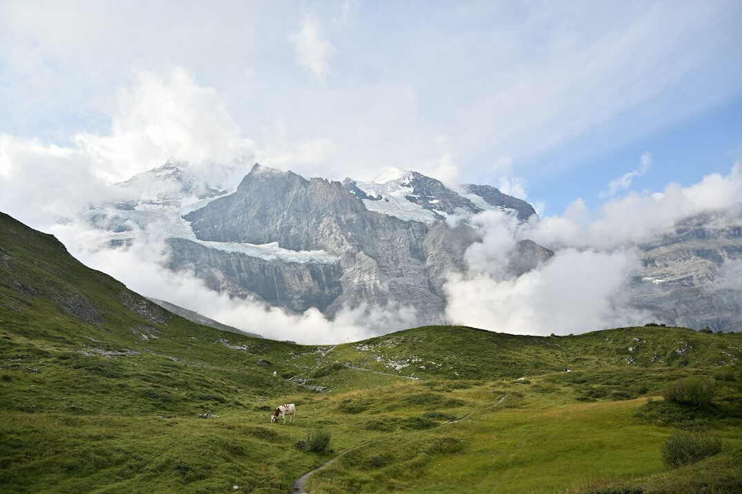 Swiss mountain train travelling through alpine scenery