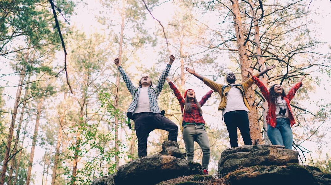 team exploring mountains